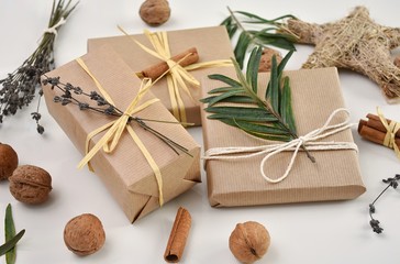 Fototapeta na wymiar Creative, eco friendly Christmas gift wrapping with natural decorations.