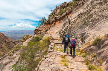 A group of tourist and backpackers walking on the Inca Trail of Bolivia outside of Sucre in...