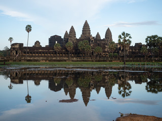 Fototapeta na wymiar Reflection of Angkor Wat in a Pond