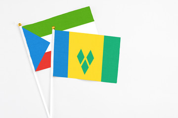 Saint Vincent And The Grenadines and Equatorial Guinea stick flags on white background. High...