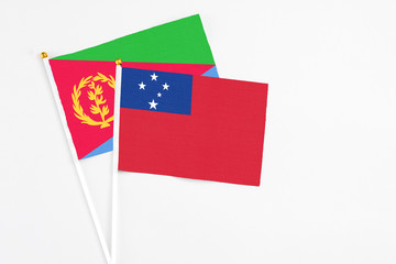 Samoa and Eritrea stick flags on white background. High quality fabric, miniature national flag....