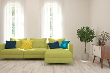 Fototapeta premium Stylish room in white color with green sofa and modern shelf. Scandinavian interior design. 3D illustration