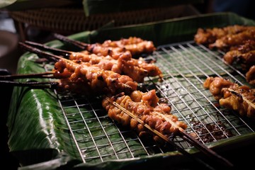 Grilled Chicken Skewers served on a Banana Leaf