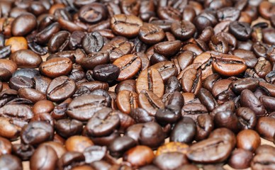 coffee beans on wooden background