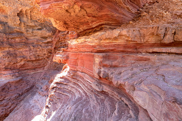 Spectacular layered surfaces of stone mountains in the Red Slot Canyon. Tourism Israel