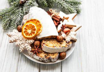 Christmas stollen on wooden background