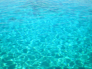 Fototapeta na wymiar The azure waters lagoon of the Red Sea near one of the sandy islands of Ras Mohammed