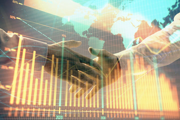 Multi exposure of forex graph and world map on abstract background with two businessmen handshake. Concept of success on international markets