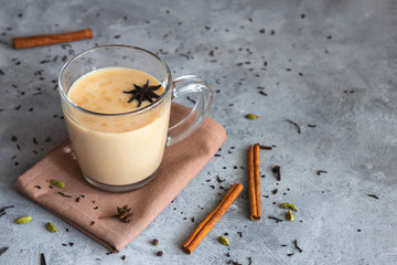 Indian masala tea on a gray background