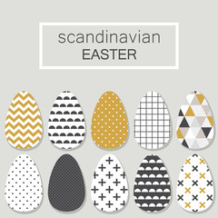 Cute Scandinavian Easter eggs card with geometric tribal ornament in black, white and gold colors of ethnic patterns