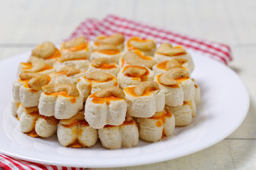 Singapore Cookie,Heart shape cookies with cashew nut on white plate
