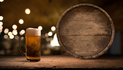Old wooden barrel on a brown background