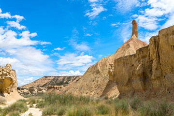 Adust riverbed in the canyon near the single rock Castildetierra in the Spanish desert Bardenas...