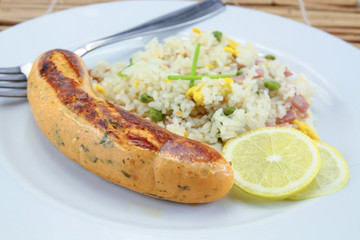 salmon sausage and Cantonese rice on a plate