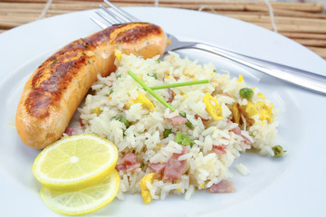 salmon sausage and Cantonese rice on a plate