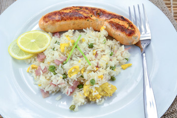salmon sausage and Cantonese rice on a plate