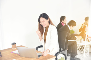 businesswoman happy in her job at office 