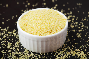 A ceramic bowl with couscous 