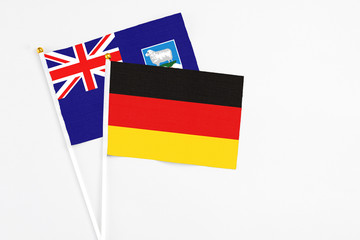 Germany and Falkland Islands stick flags on white background. High quality fabric, miniature national flag. Peaceful global concept.White floor for copy space.