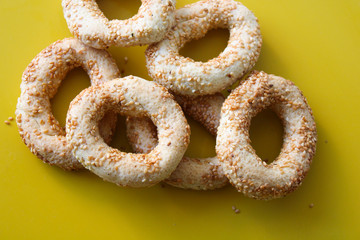 small pastry rings with sesame seed