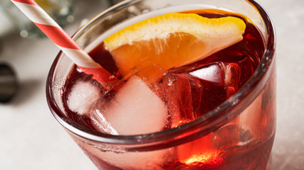 Summer cool cocktail. Negroni, Americano, Alcohol with tonic Red cocktail