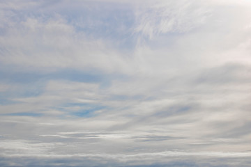 Dramatic cloudy blue sky over the ocean on a overcast day.