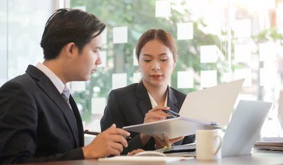 Business working in office with documents and laptop people Consulting and business planning.