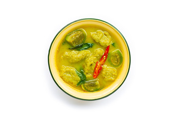 Thai food, Green curry with fish ball on white.