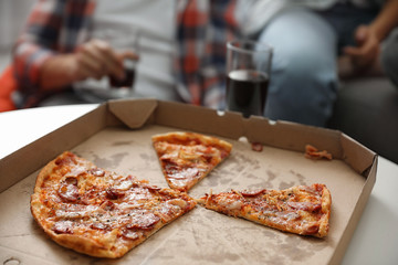 Tasty fresh pizza on table indoors, closeup