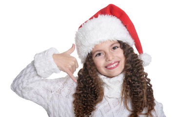 Portrait of smiling little girl with Christmas hat