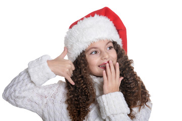 Portrait of smiling little girl with Christmas hat