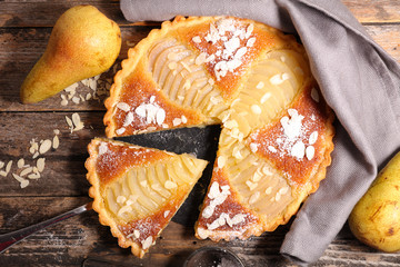 pear tart with almond cream, top view - obrazy, fototapety, plakaty