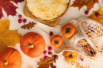 pumpkin cheesecake with persimmon. autumn concept.