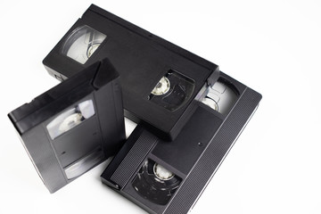 Old videotapes on a white background.