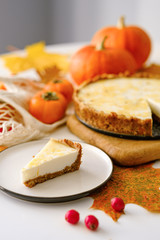 pumpkin cheesecake with persimmon. autumn concept.