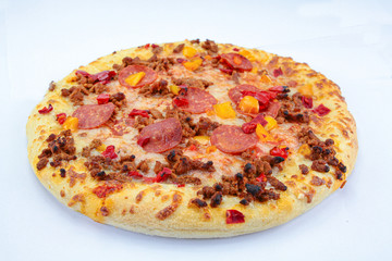 whole pizza with chorizo and mozzarella on a white background