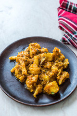 Indian Food Spicy Masaledar Aloo Gobi and Beans Tawa Sabzi Recipe.