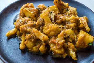 Indian Food Spicy Masaledar Aloo Gobi and Beans Tawa Sabzi Recipe.