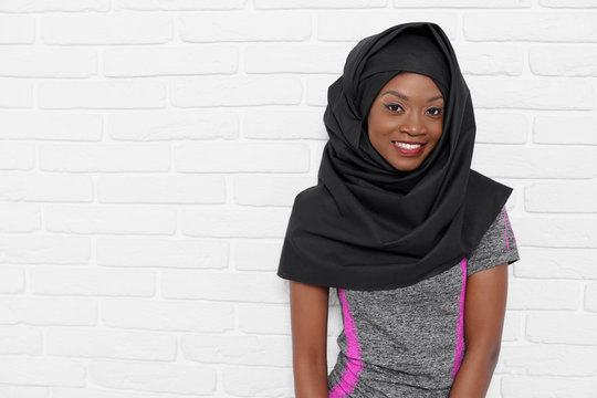 Pretty Islamic Woman In Hijab And Sport Uniform Posing