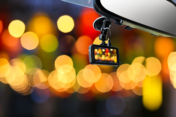 CCTV car camera for safety on the road accident on abstract blurred bogey light of city in night...