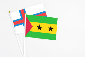 Sao Tome And Principe and Faroe Islands stick flags on white background. High quality fabric,...