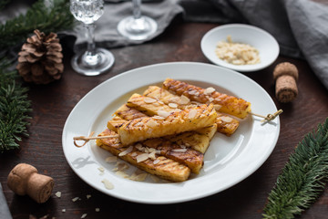 Caramelized Grilled Pineapple Wedges on Wooden Skewers. Holiday Appetizer.