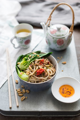 Chinese Udon Noodles with Minced Pork in Spicy Sauce Served with Pak Choi