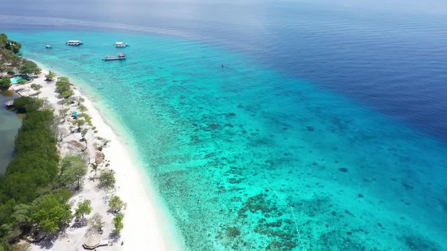 Top view of sandy beach and  the Sumilon island beach landing near Oslob, Cebu, Philippines.