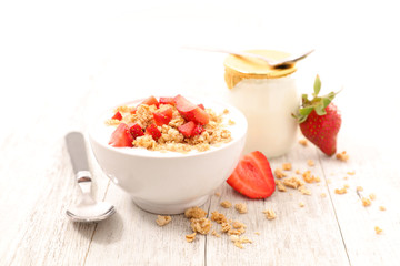 bowl of muesli, yogurt and strawberry