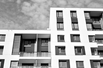 Contemporary apartment building. Generic residential architecture. Black and white.