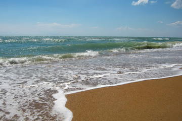 Restless noisy sea in the summer. The feeling of an approaching storm