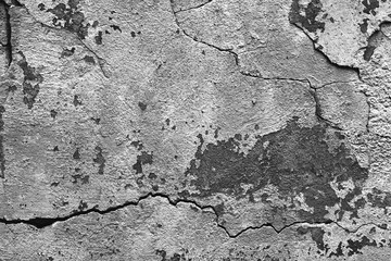 Grey abstract background. Cracks on the old concrete surface. Free space. Blank space background texture