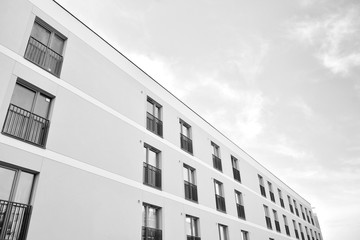 Contemporary apartment building. Generic residential architecture. Black and white.