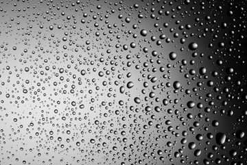 water drops on glass gradient background